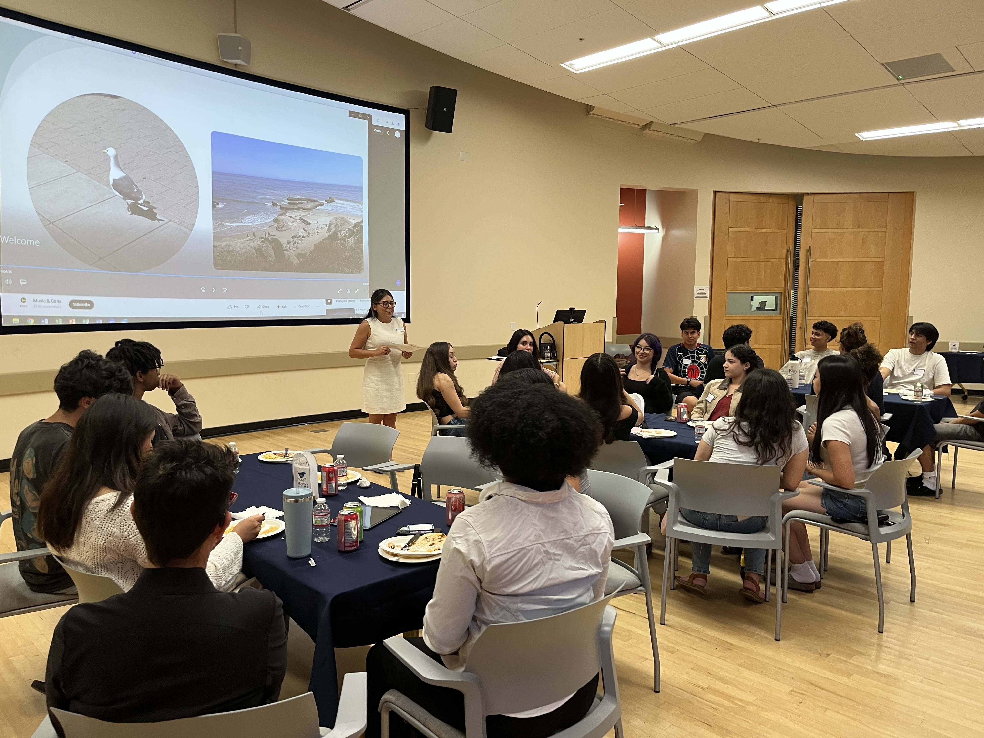 Gabby speaking at kick off dinner